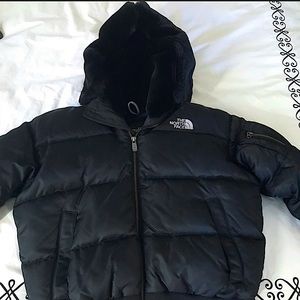 Woman’s north face puffer coat with fur hood